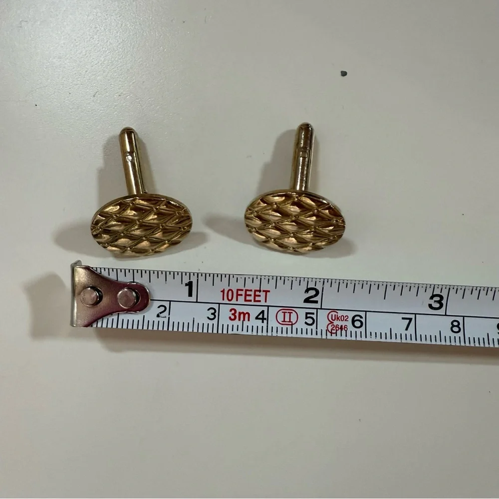 Vintage mid century modern Gold tone quilted slant shank oval cufflink